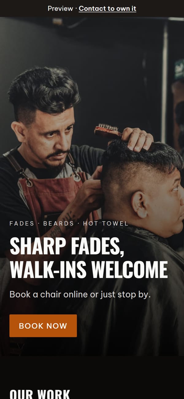 Ironline Barber Co. site on a phone