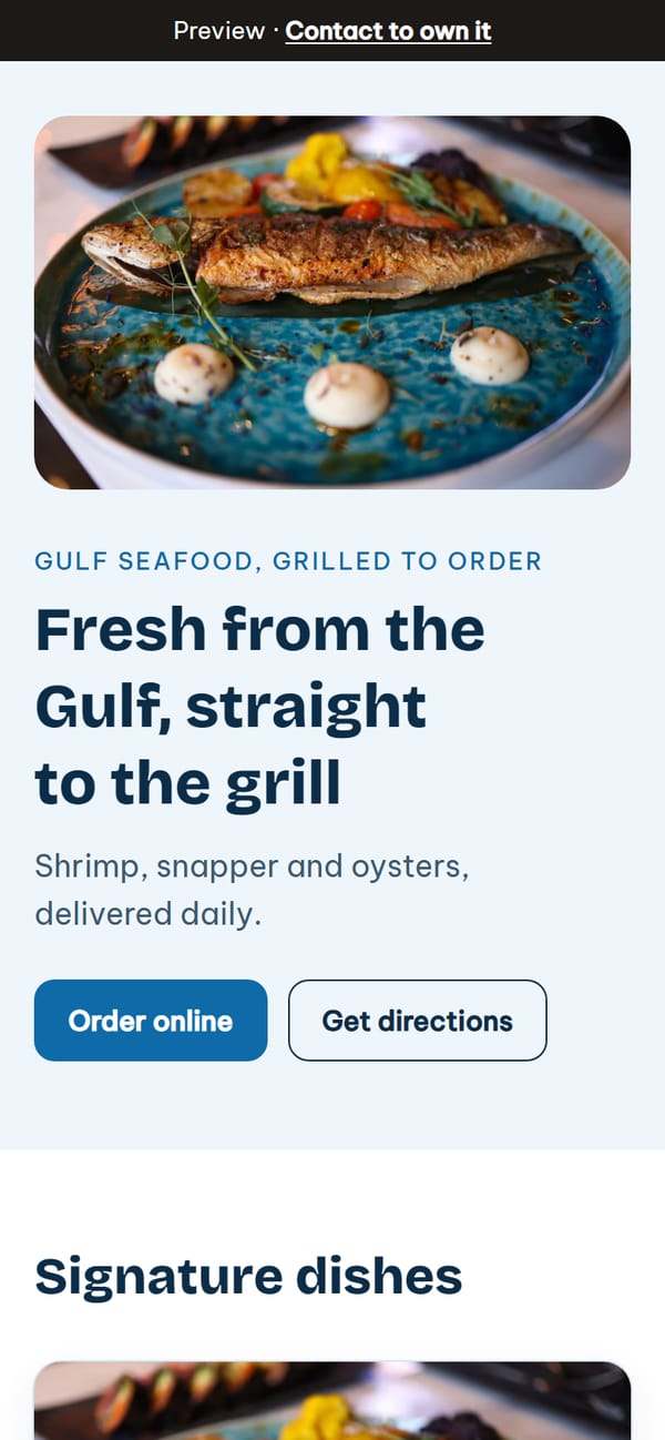 Blue Harbor Seafood & Grill site on a phone
